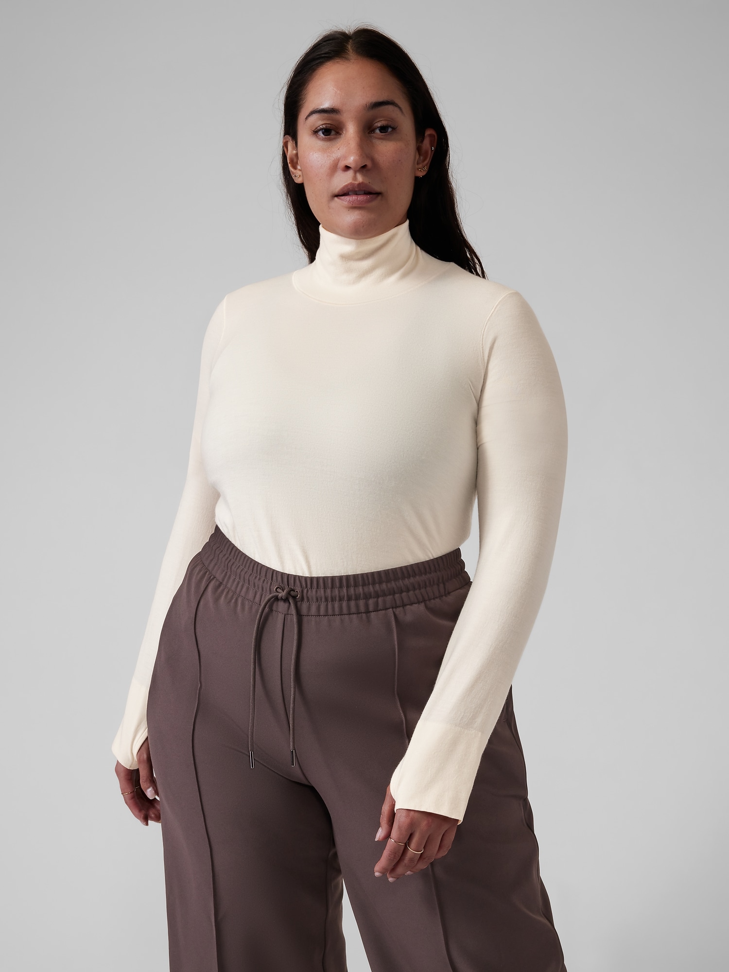 Athleta Foresthill Ascent Seamless Turtleneck beige. 1