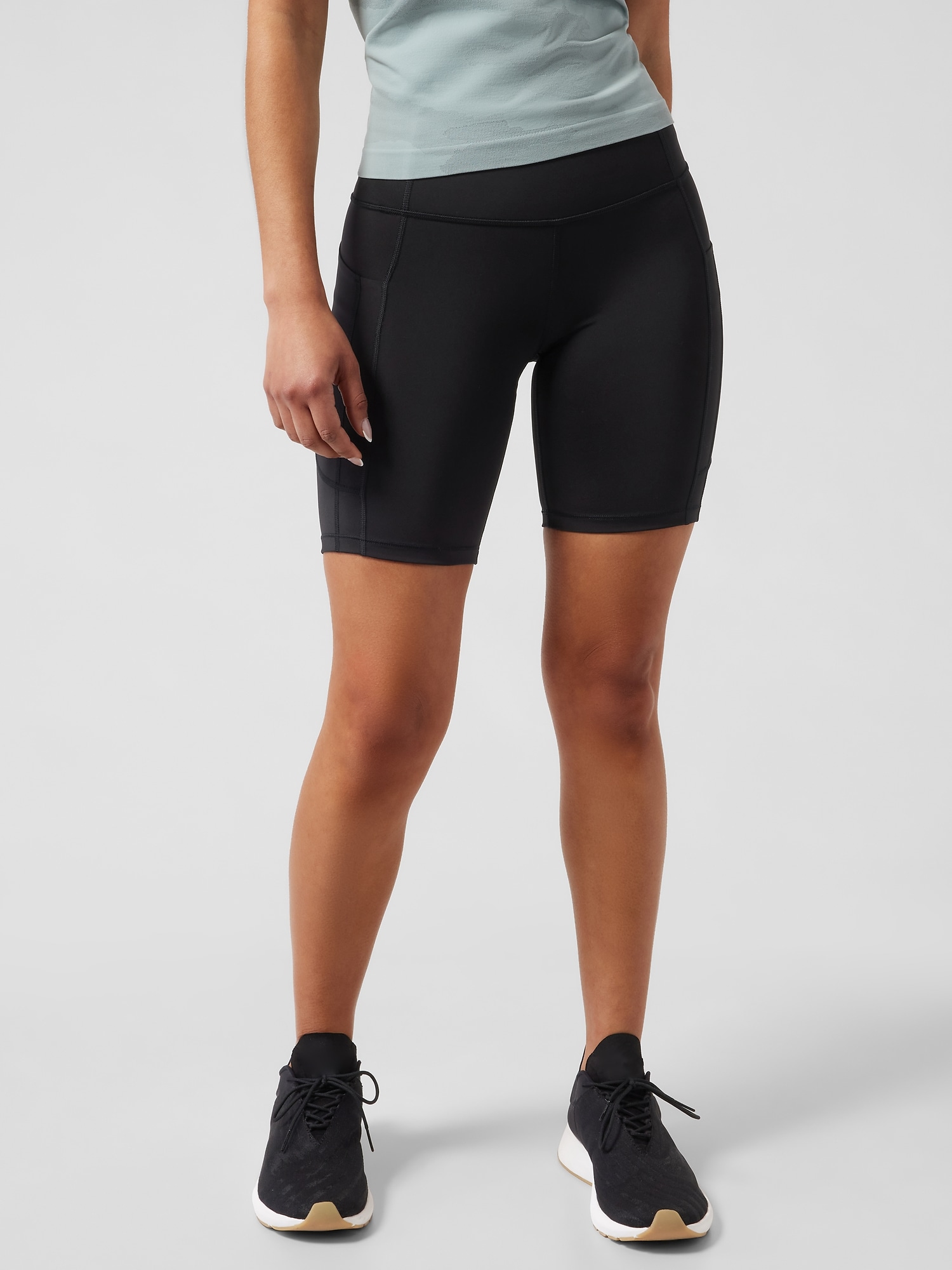 Athleta Ultimate Stash High Rise 7 Short black. 1