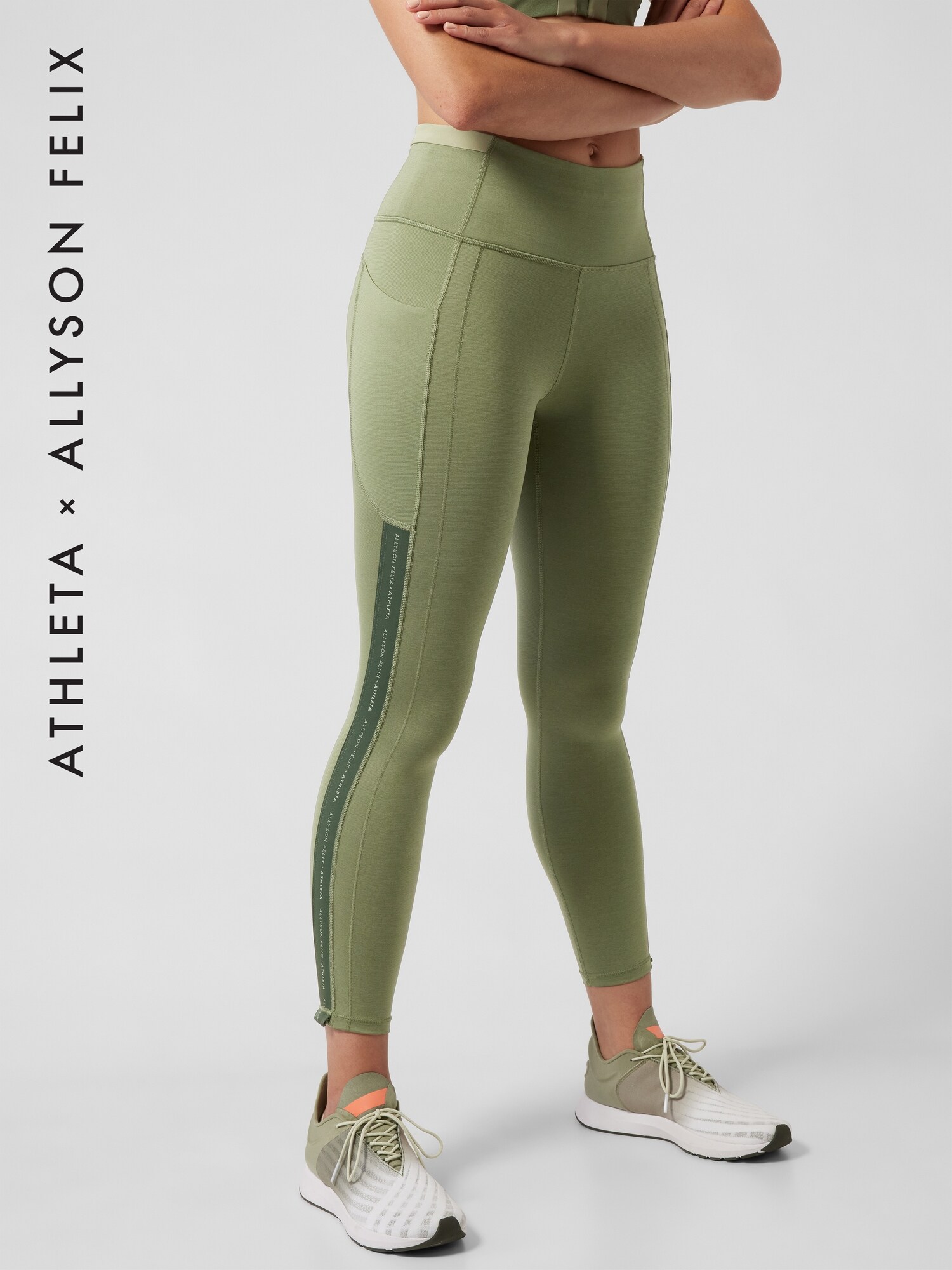 Athleta Ultimate Stash Legend Tight green. 1