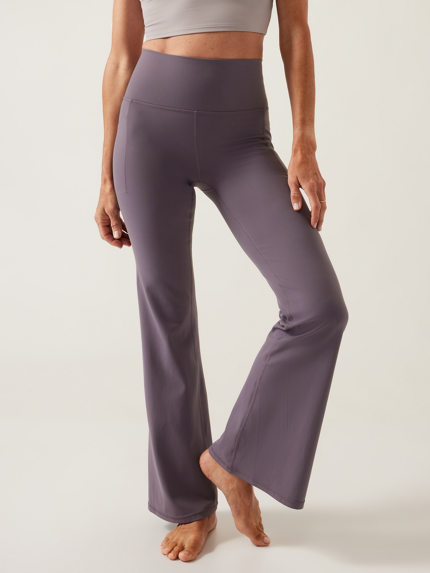 Athleta Salutation Stash Flare Pant purple. 1