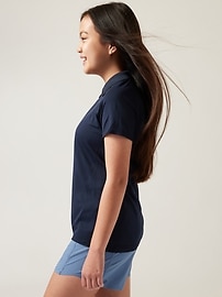 View large product image 3 of 3. Athleta Girl Power Up Seamless Short Sleeve Polo