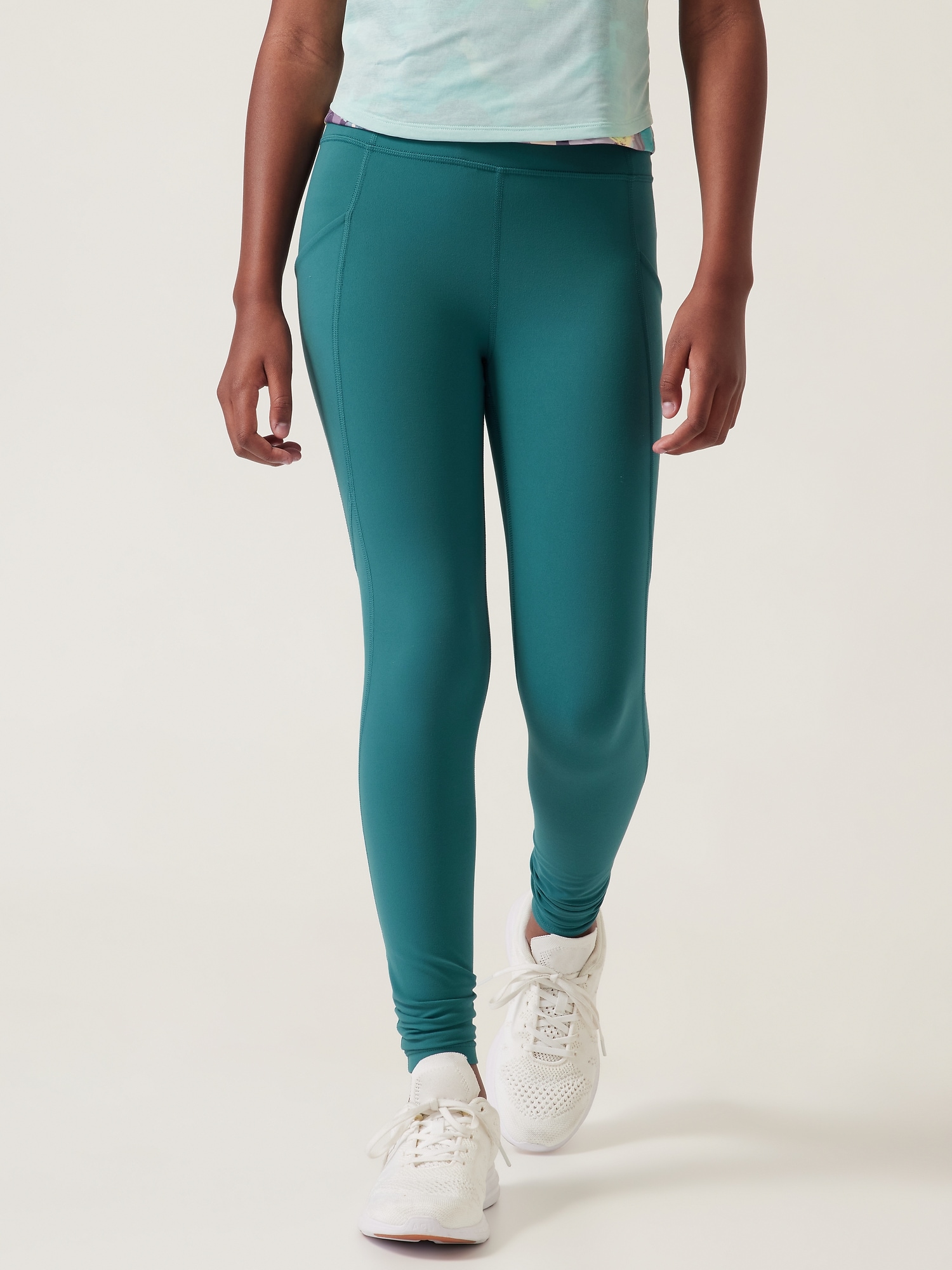 Athleta Girl High Rise Stash Your Treasures Tight green. 1