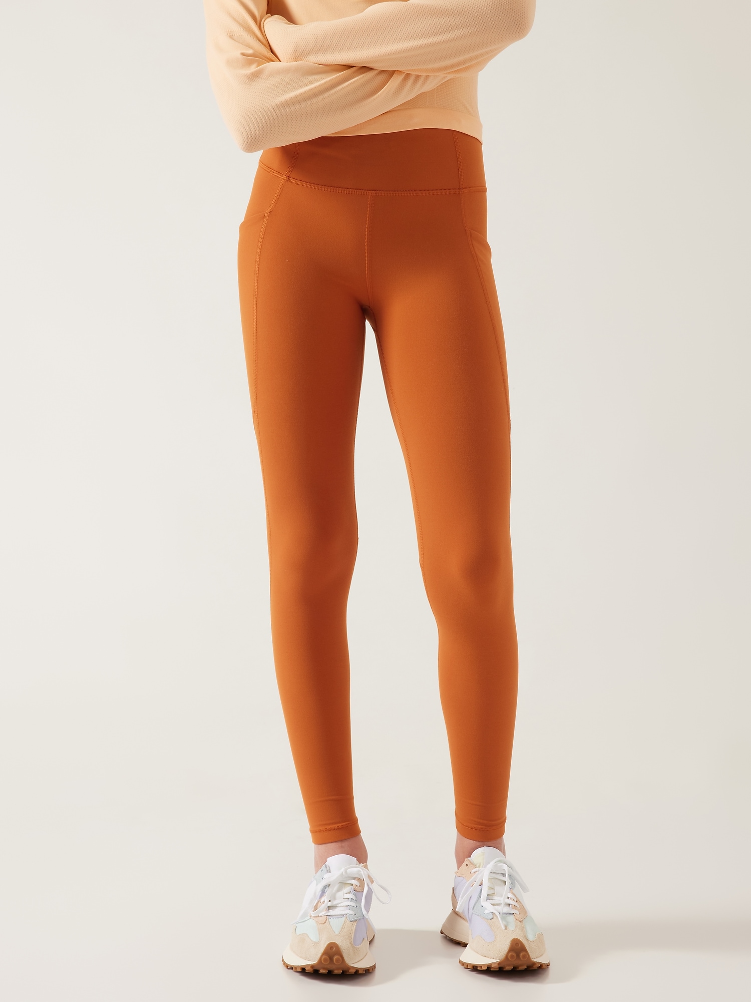 Athleta Girl High Rise Stash Your Treasures Tight orange. 1