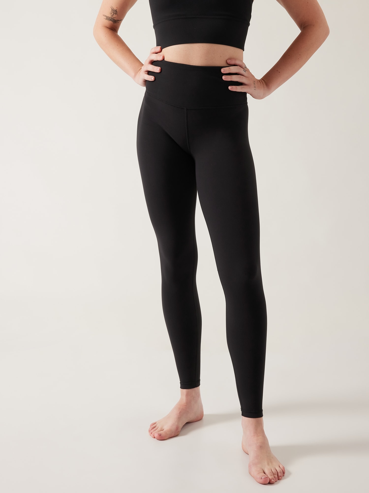 Athleta Elation Ultra High Rise Tight black. 1