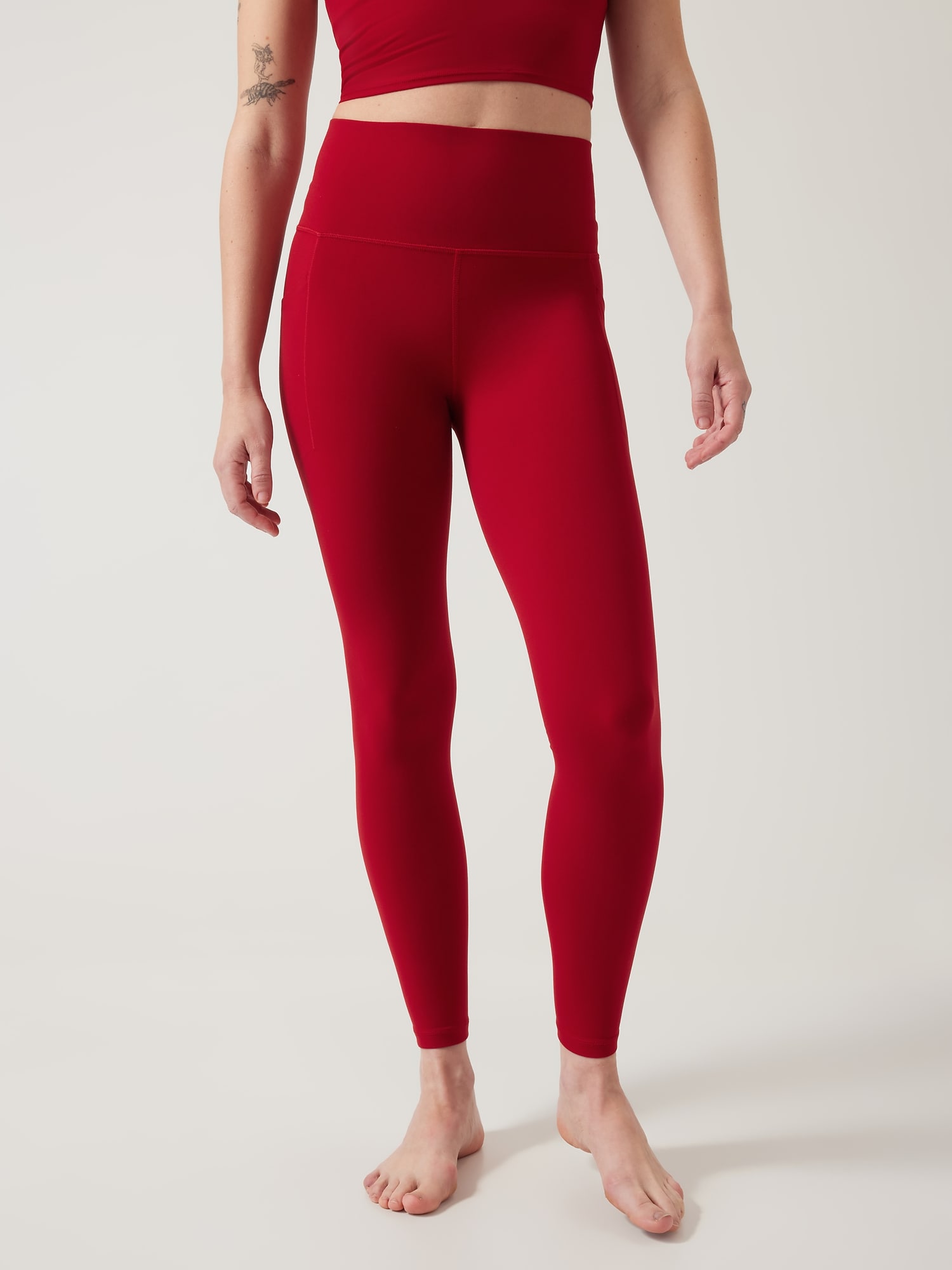 Athleta Salutation Stash Tight red. 1