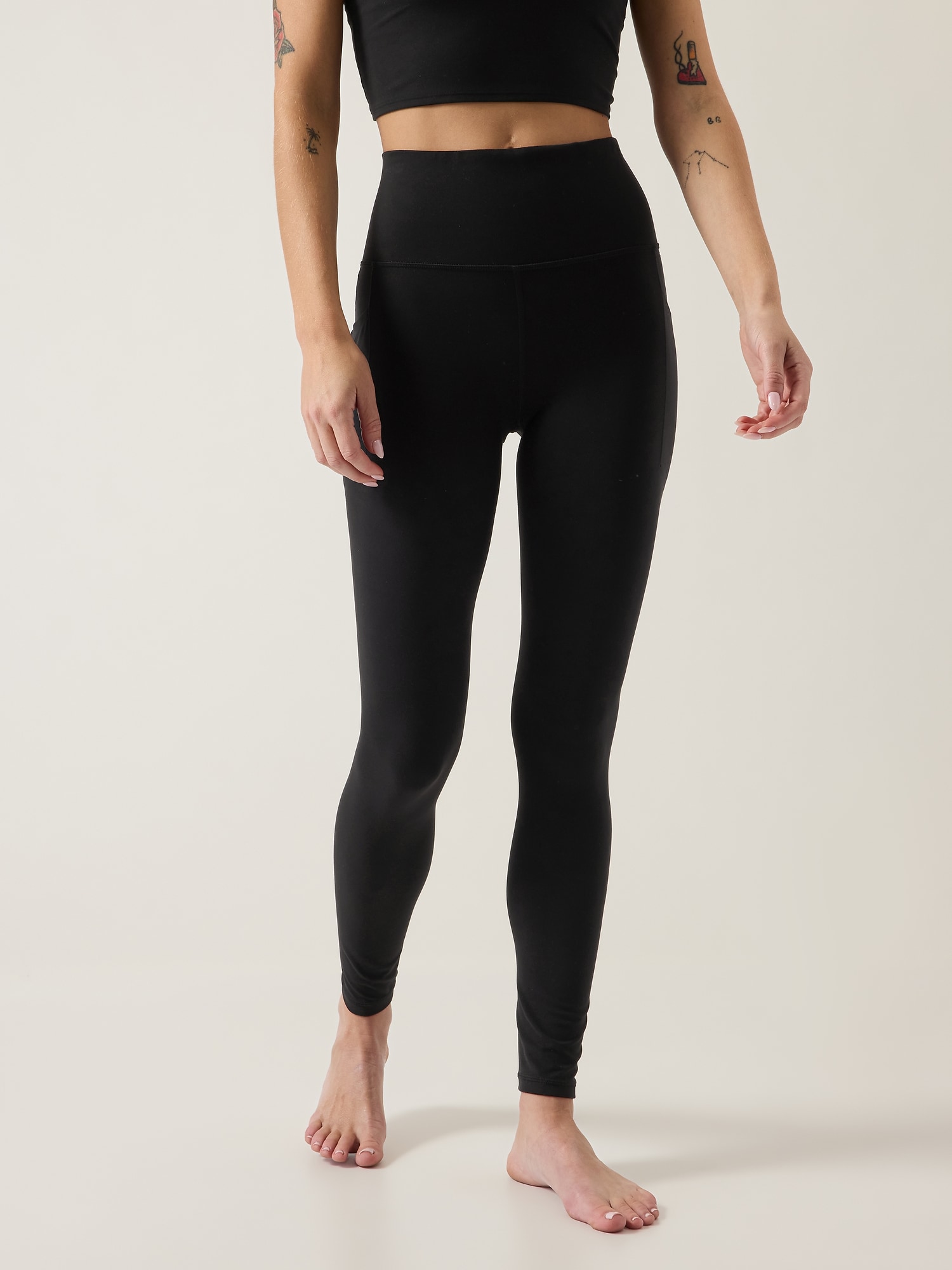 Athleta Salutation Stash High Rise Legging black. 1