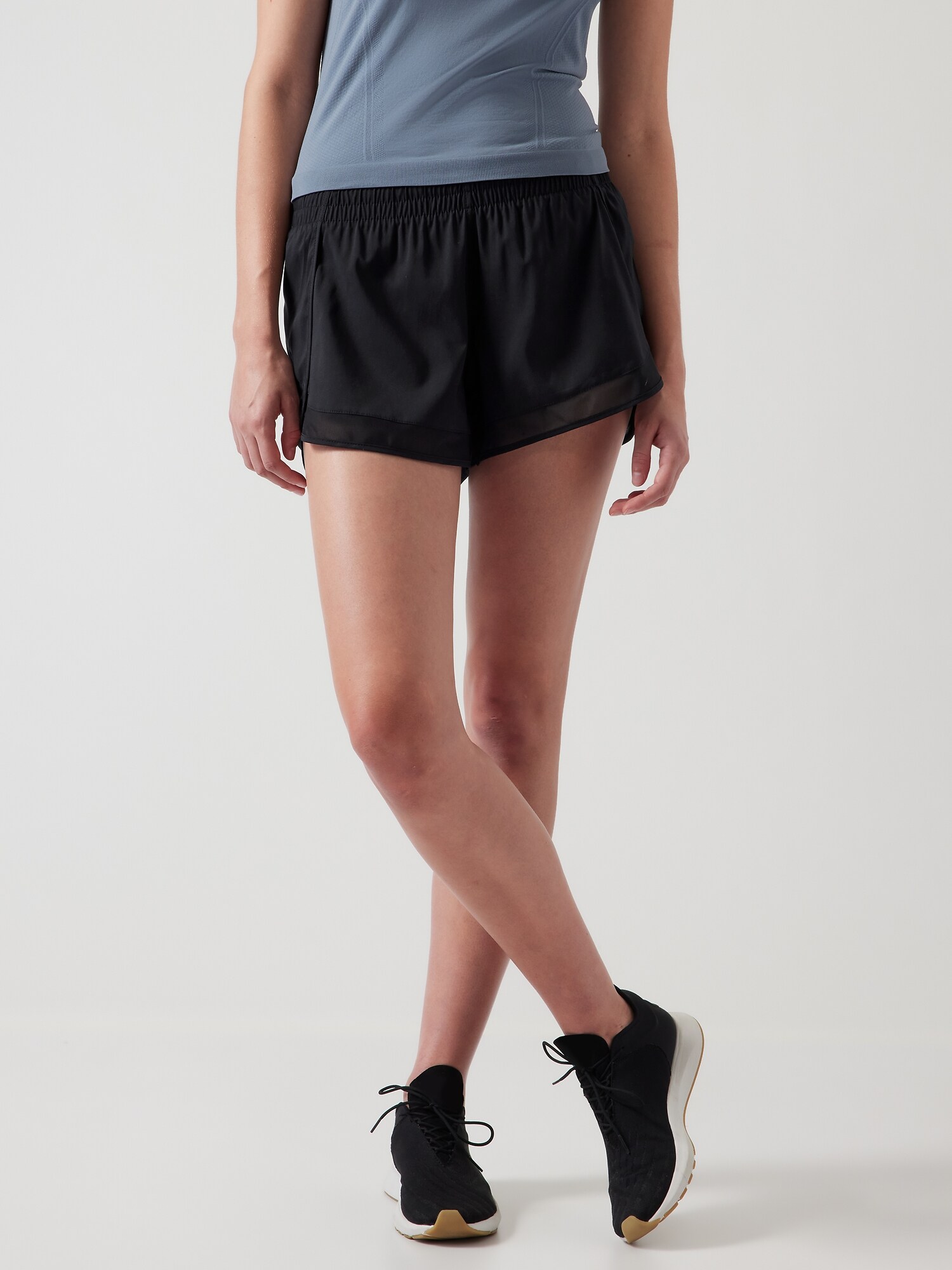 Athleta Mesh Racer Run Mid Rise 4 Short black. 1