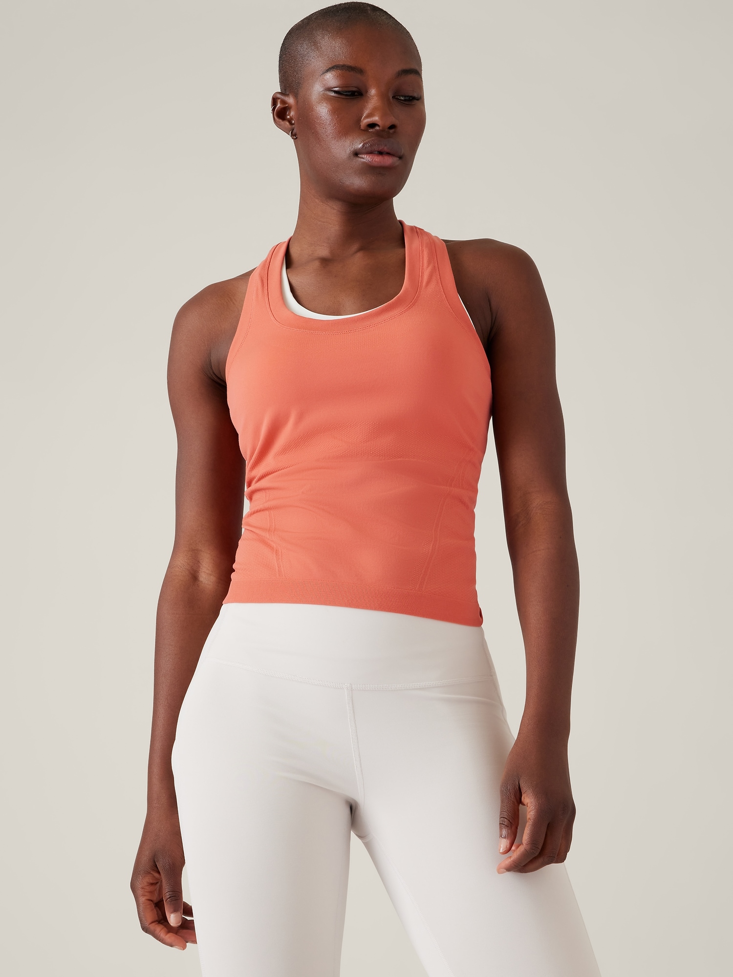 Athleta Momentum Seamless Sport Length Tank orange. 1