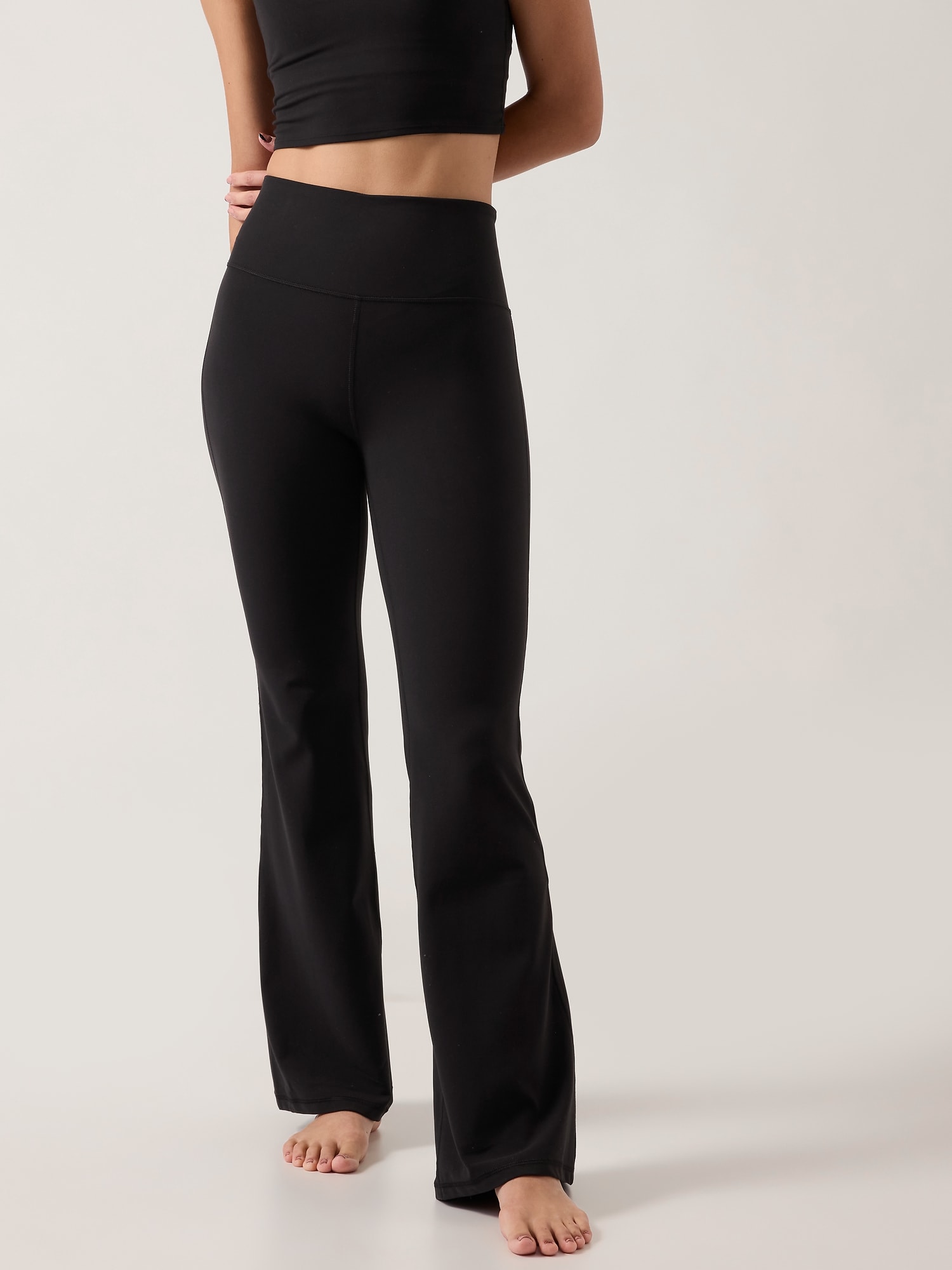 Athleta Elation Ultra High Rise Flare Pant black. 1