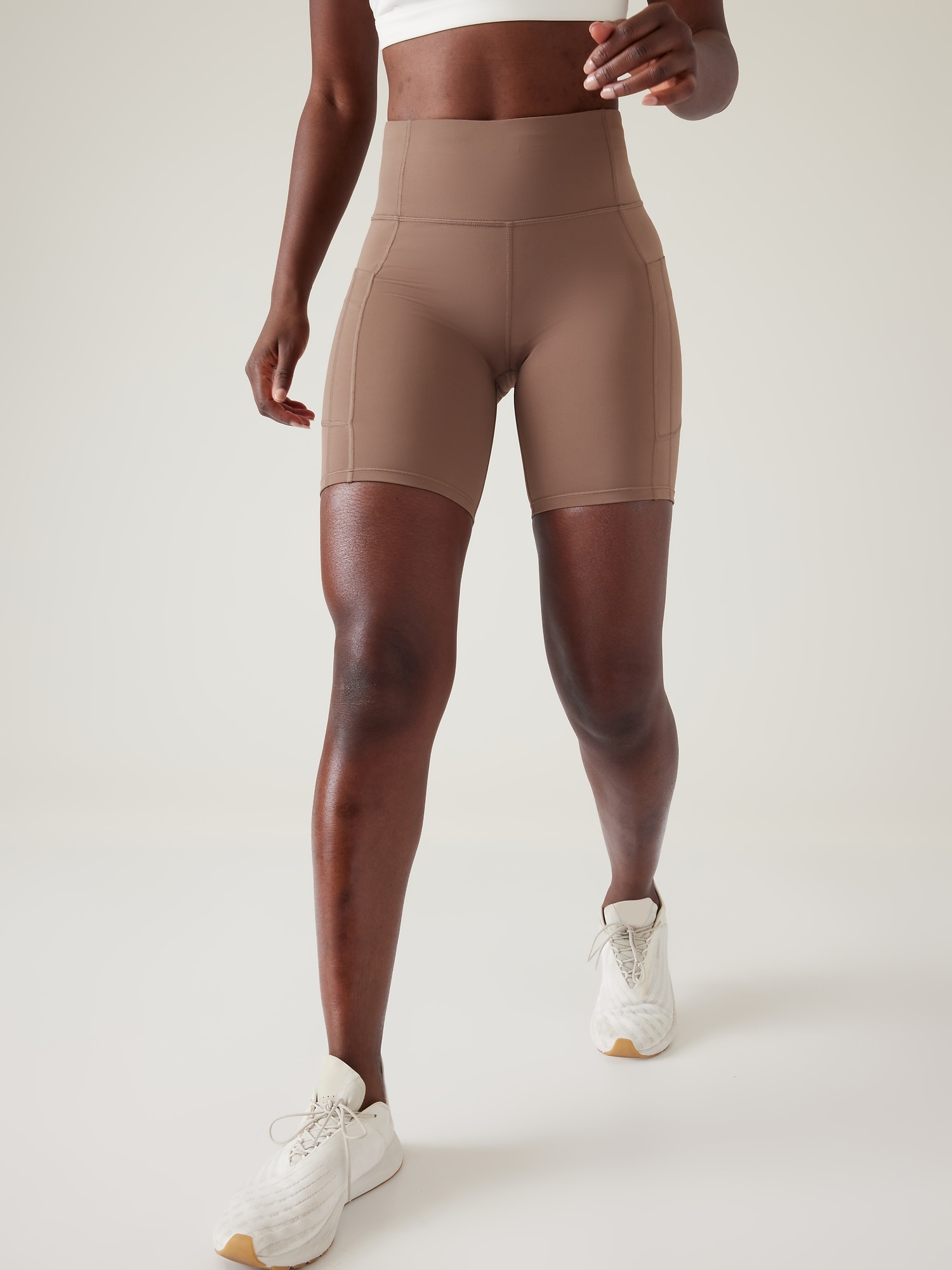 Athleta Ultimate Stash 7 Short beige. 1