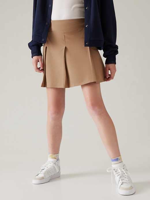 L'image numéro 1 présente Jupe-short d’uniforme à plis Athleta Girl