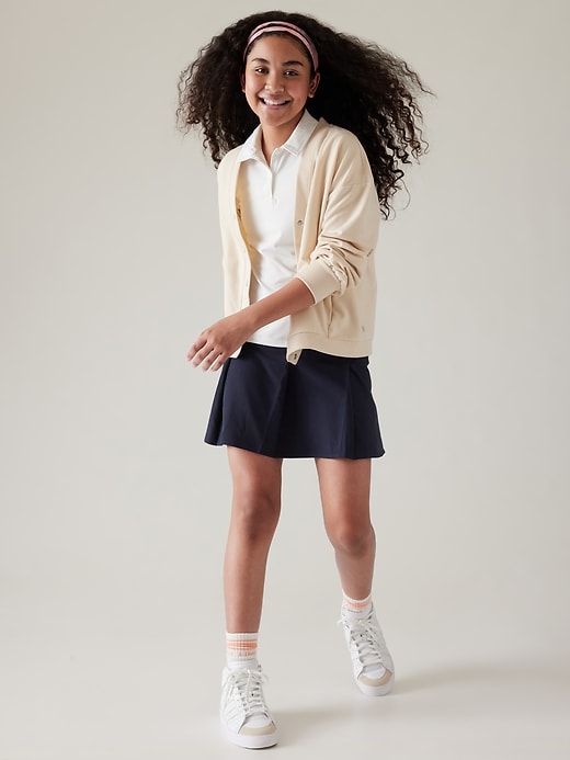 L'image numéro 6 présente Jupe-short d’uniforme à plis Athleta Girl