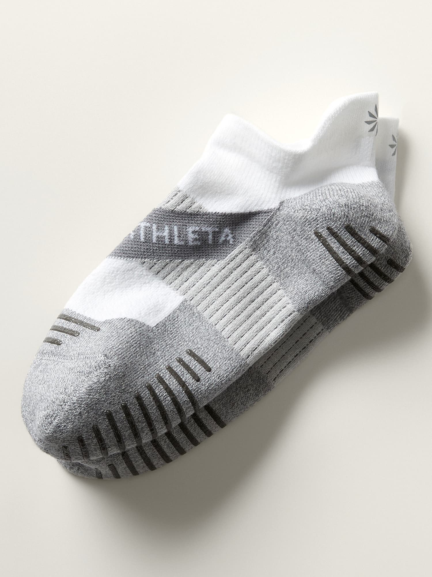 Grip socks for pilates can cost double or triple what regular socks co