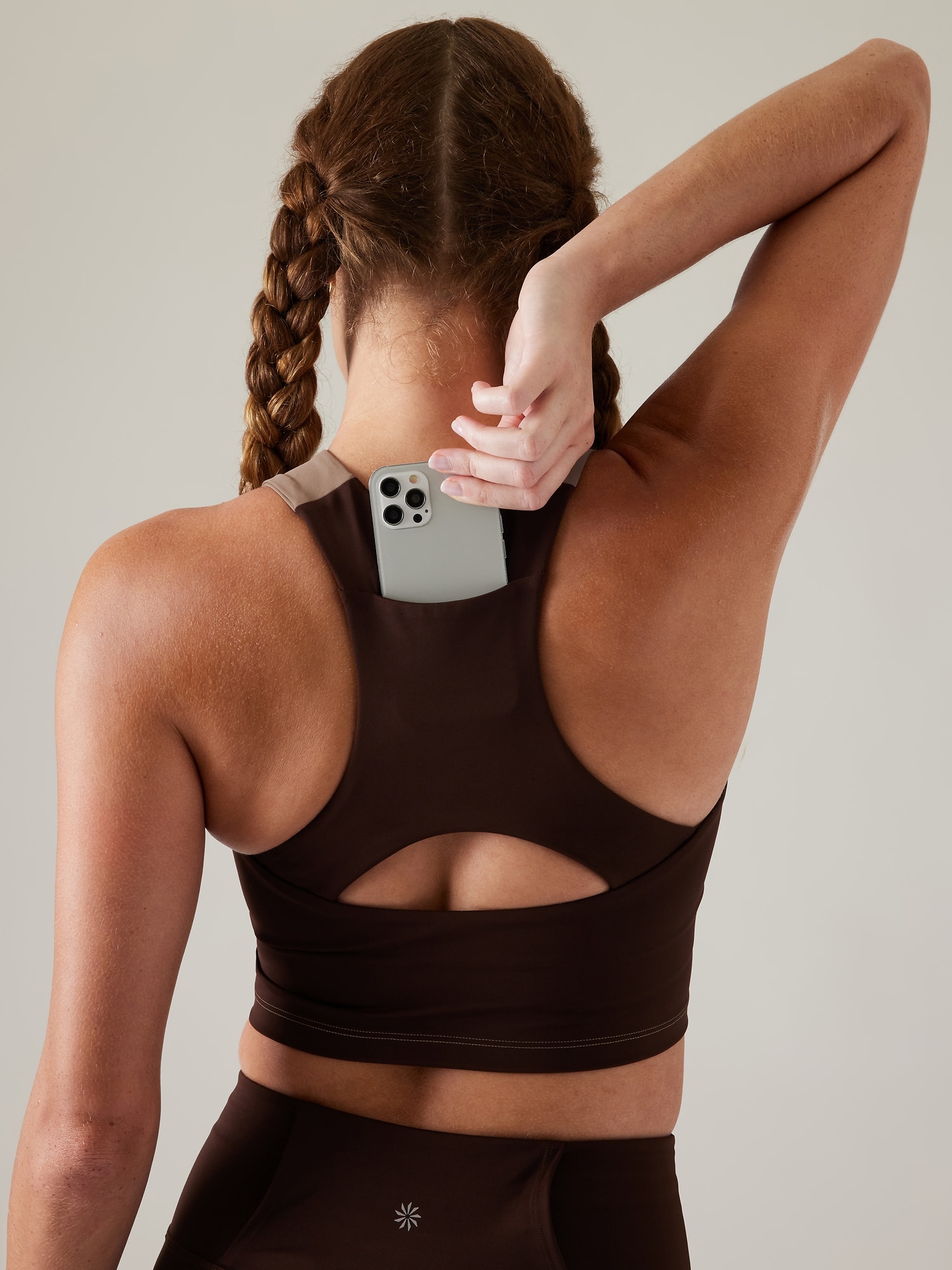 Action bra with phone pouch