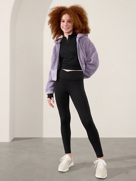 L'image numéro 1 présente Legging 7/8 à effet croisé Transcend Athleta Girl