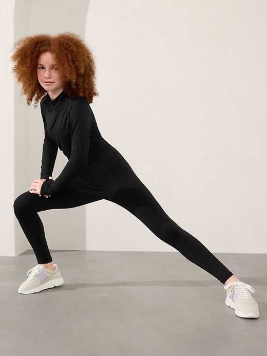 L'image numéro 2 présente Legging 7/8 à effet croisé Transcend Athleta Girl