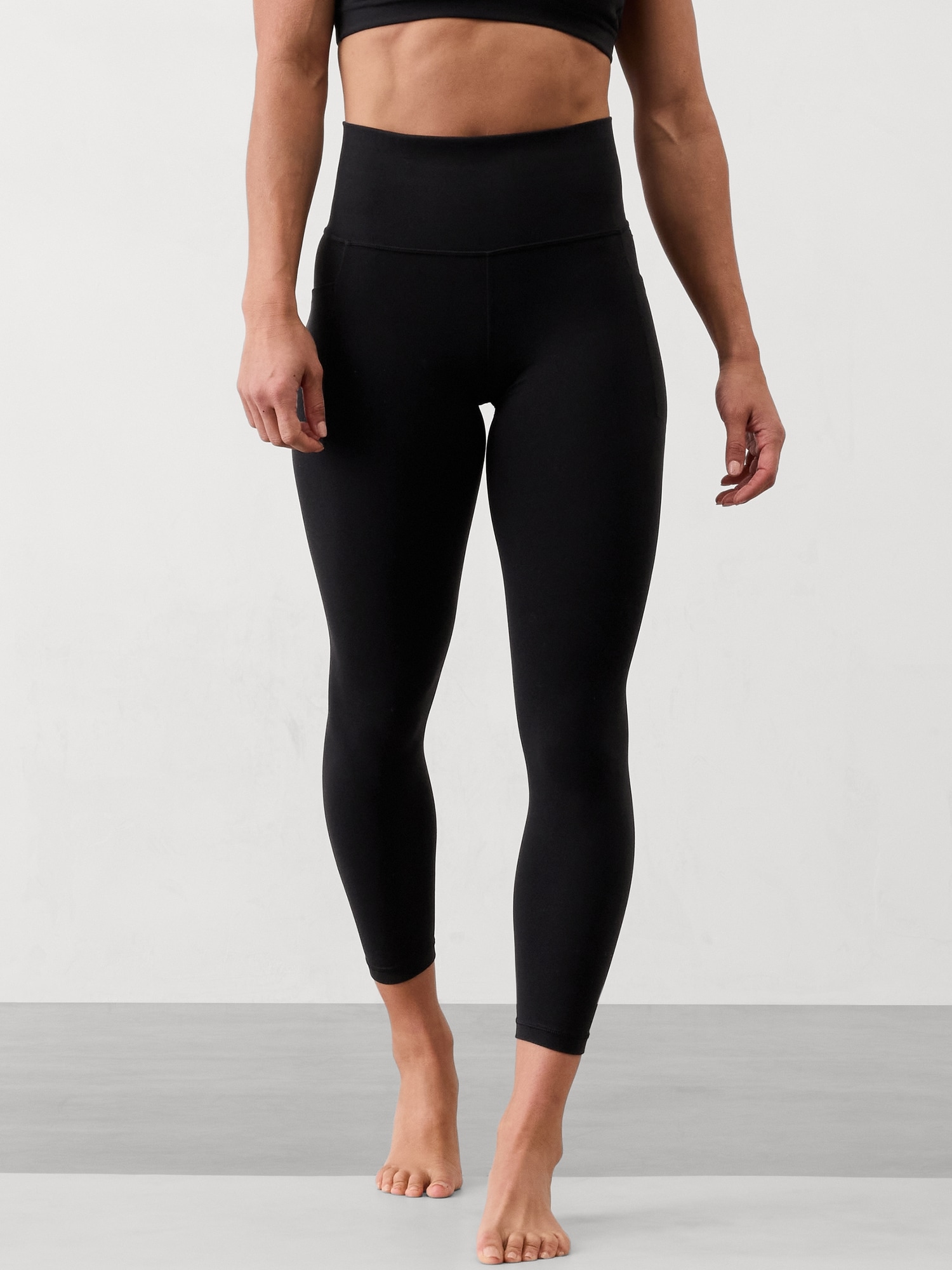 Legging 7/8 à taille haute et poches dissimulées Salutation