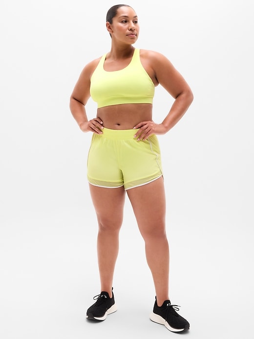 Image number 5 showing, Mesh Racer Run Mid Rise 4" Short