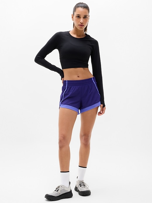 Image number 1 showing, Mesh Racer Run Mid Rise 4" Short